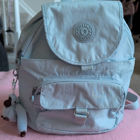 Kipling Handbags - Kipling Pastel Blue Nylon Mini Backpack with Monkey Charm